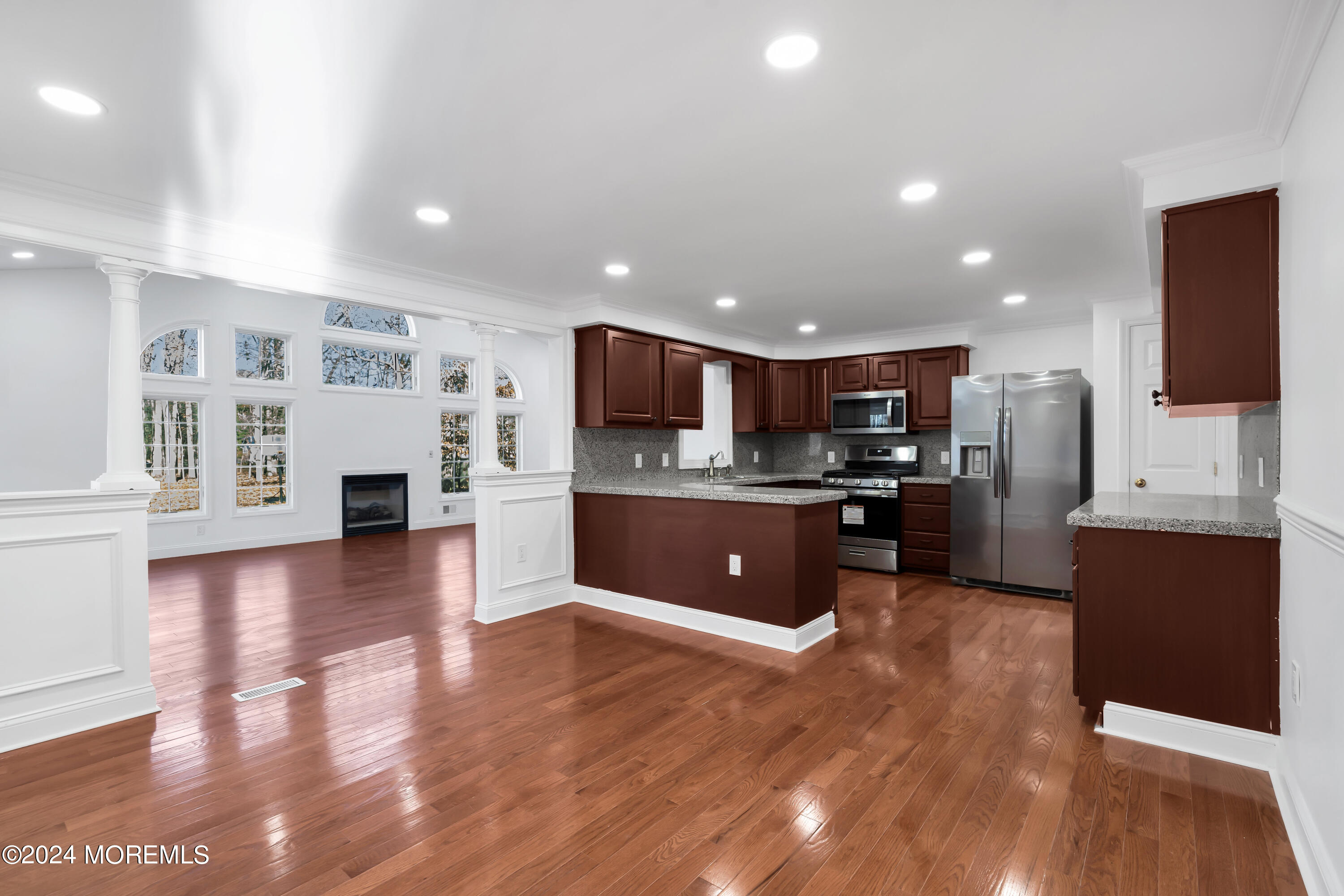 6 Afton Road Jackson, NJ 08527 - Photo 11 of 80 a large kitchen with stainless steel appliances kitchen island a large counter top and a refrigerator