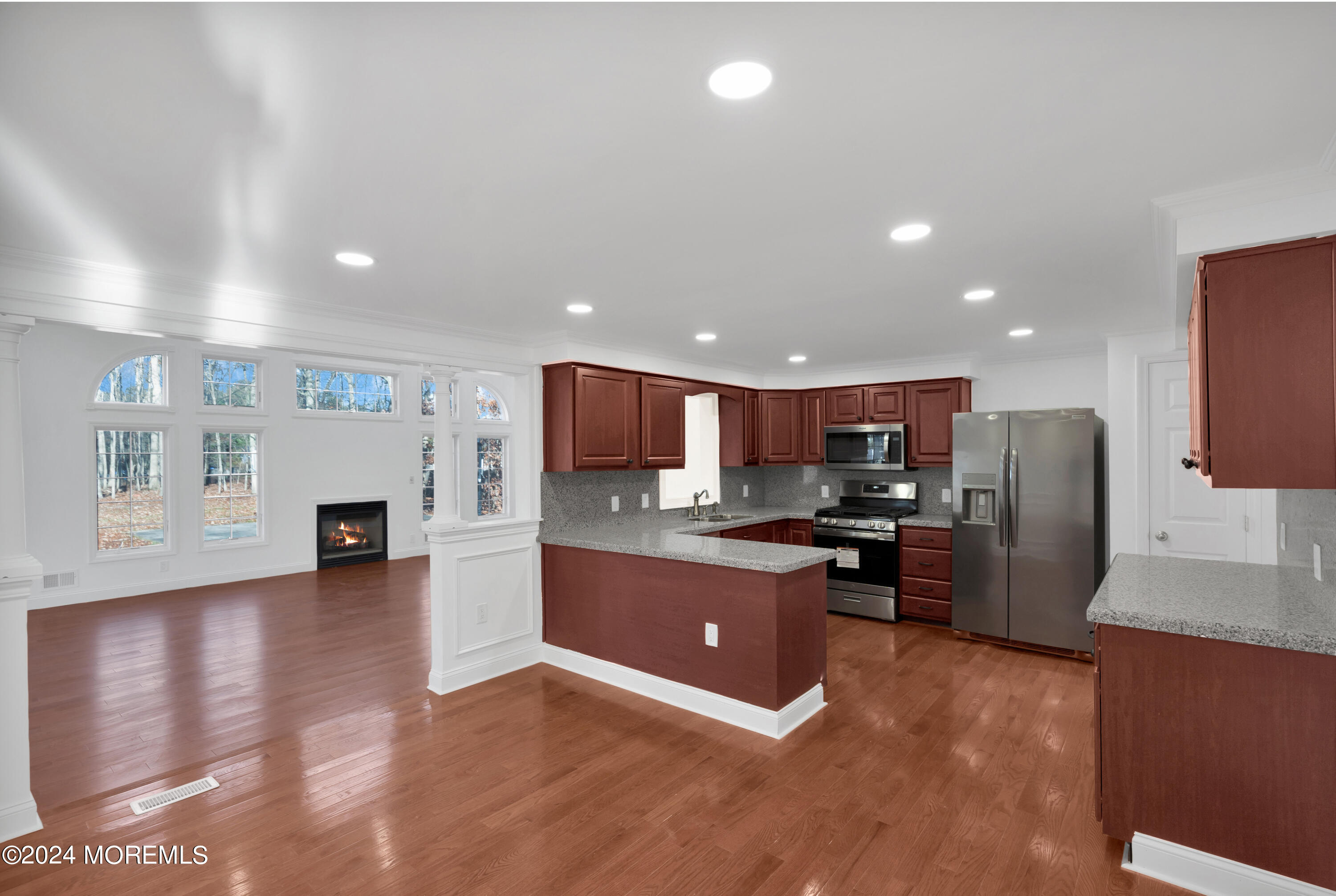 6 Afton Road Jackson, NJ 08527 - Photo 19 of 80 a kitchen with stainless steel appliances granite countertop a refrigerator stove microwave and sink
