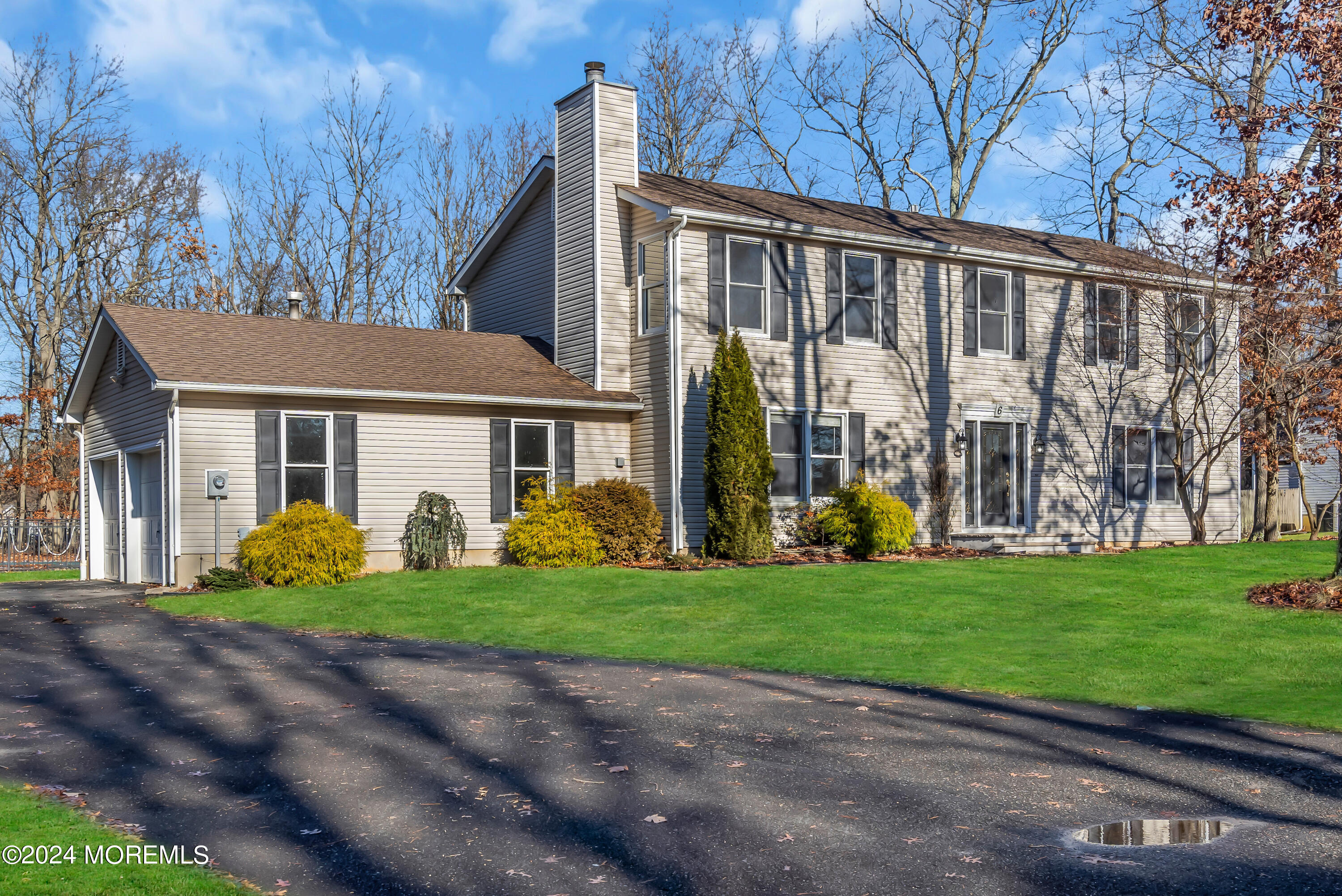 6 Afton Road Jackson, NJ 08527 - Photo 2 of 80 a front view of a house with garden and porch