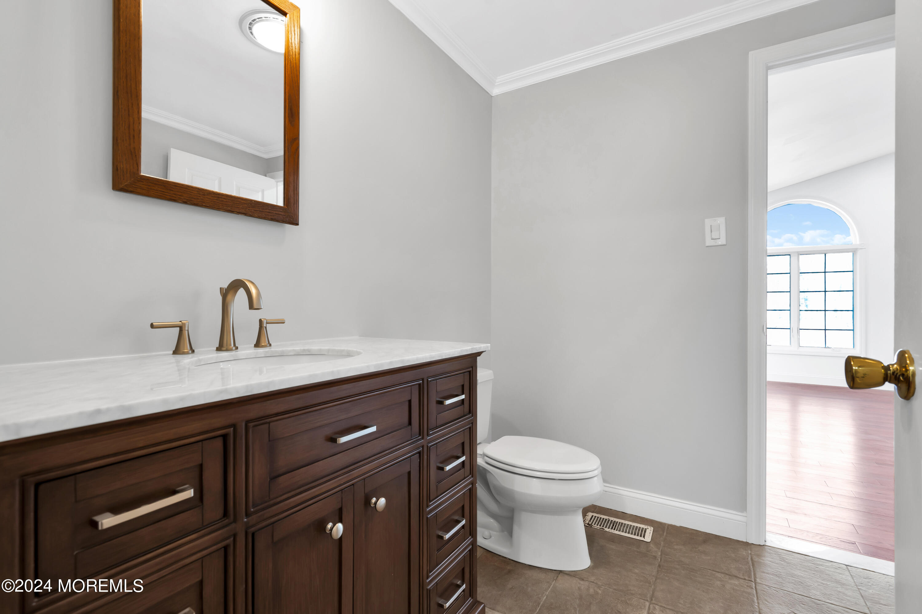 6 Afton Road Jackson, NJ 08527 - Photo 26 of 80 a bathroom with a toilet sink and mirror