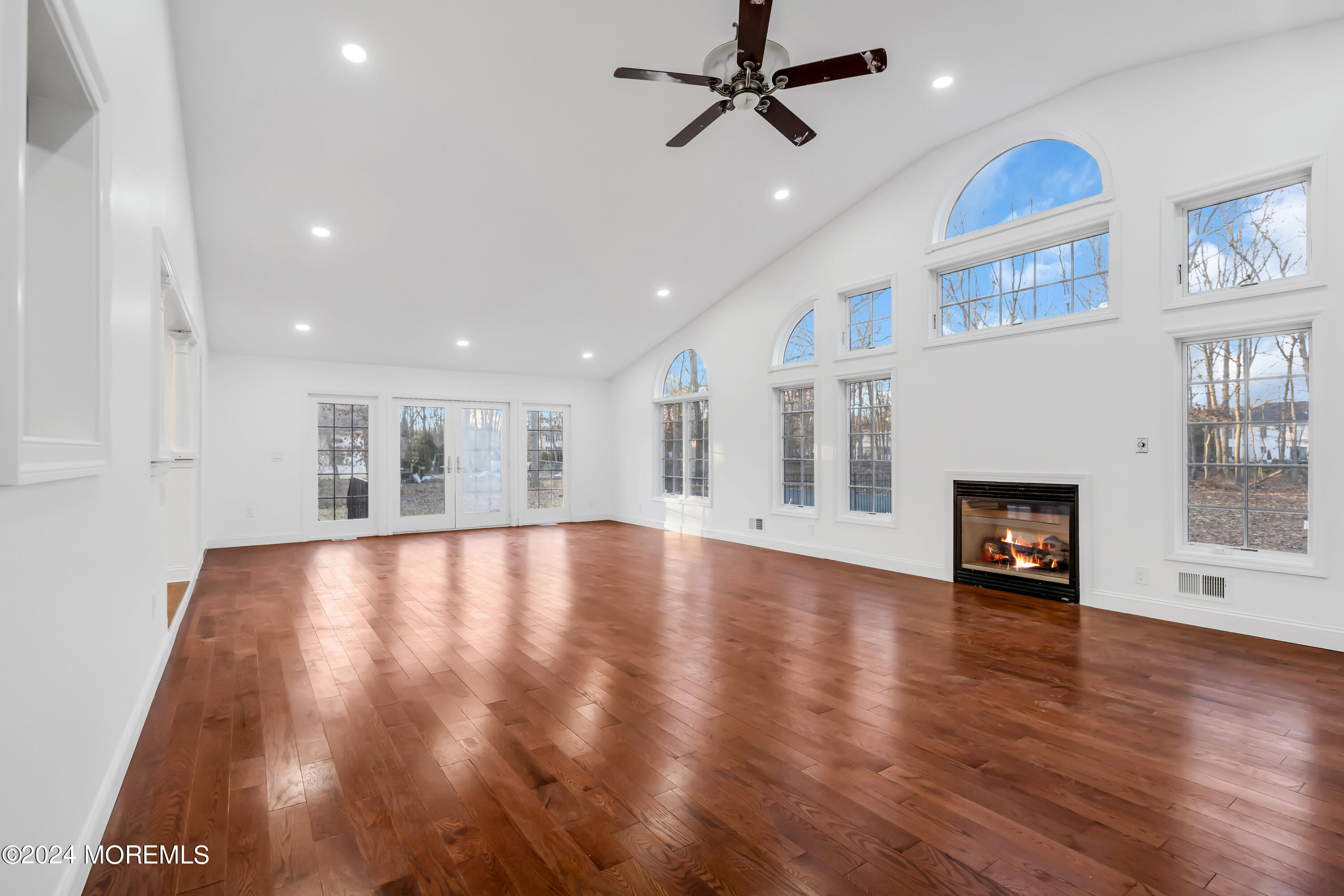 6 Afton Road Jackson, NJ 08527 - Photo 31 of 80 a view of an empty room with a fireplace and a window