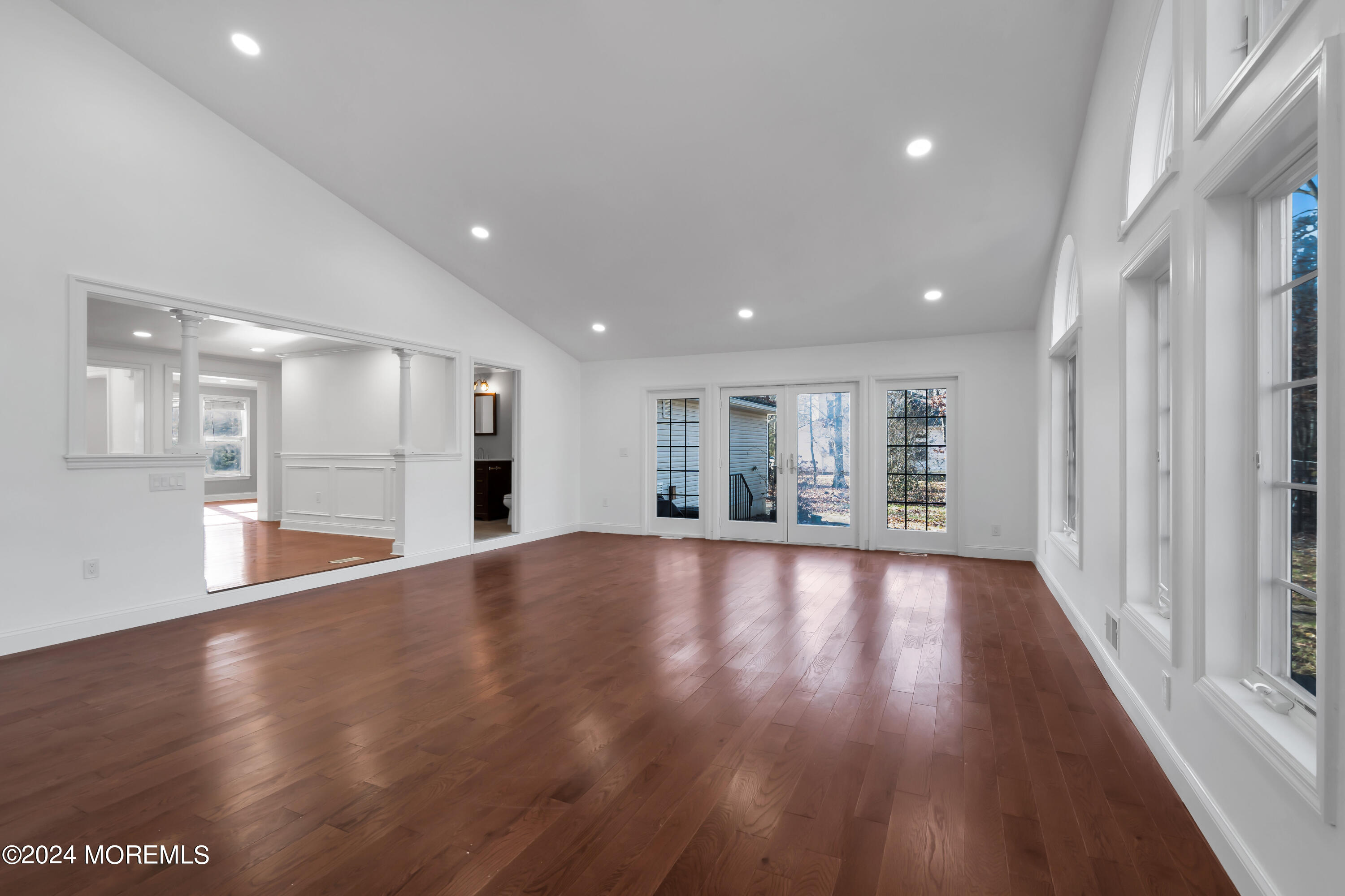 6 Afton Road Jackson, NJ 08527 - Photo 36 of 80 a view of an empty room with wooden floor and a window