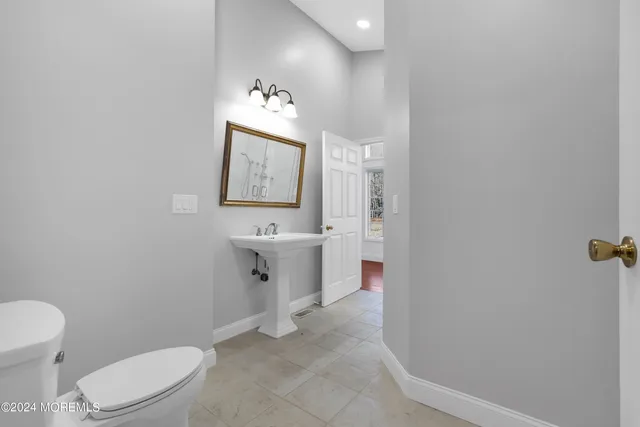 a white bath tub sitting in a bathroom