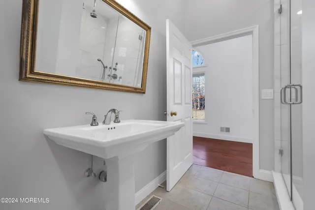 a view of a park with large trees