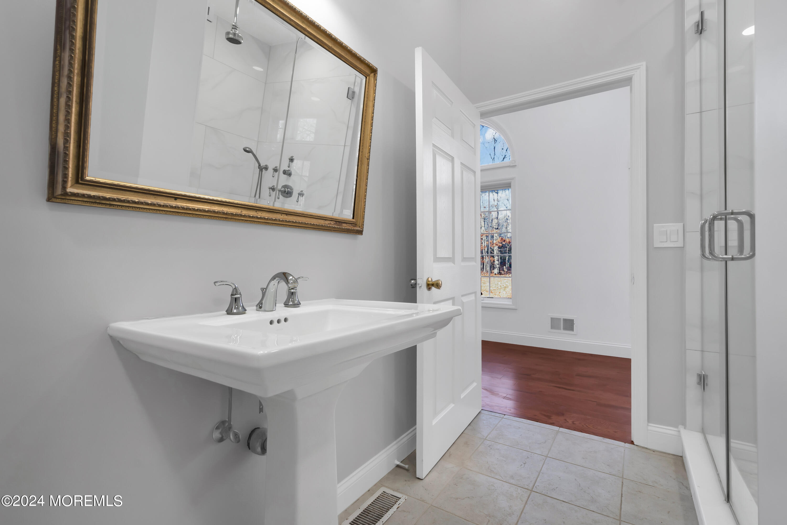 6 Afton Road Jackson, NJ 08527 - Photo 43 of 80 a bathroom with a sink and a mirror