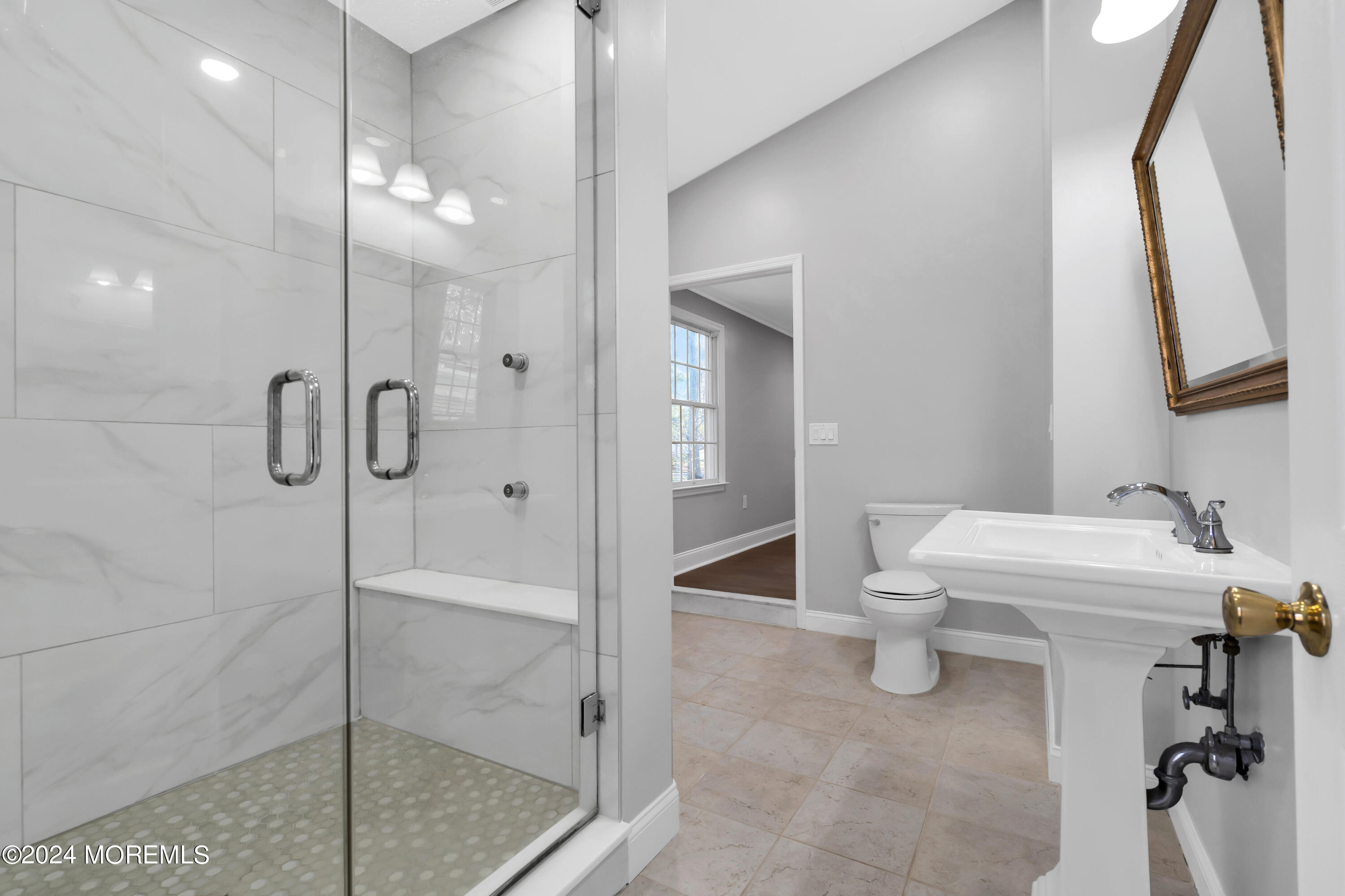 6 Afton Road Jackson, NJ 08527 - Photo 44 of 80 a bathroom with a sink a toilet and shower