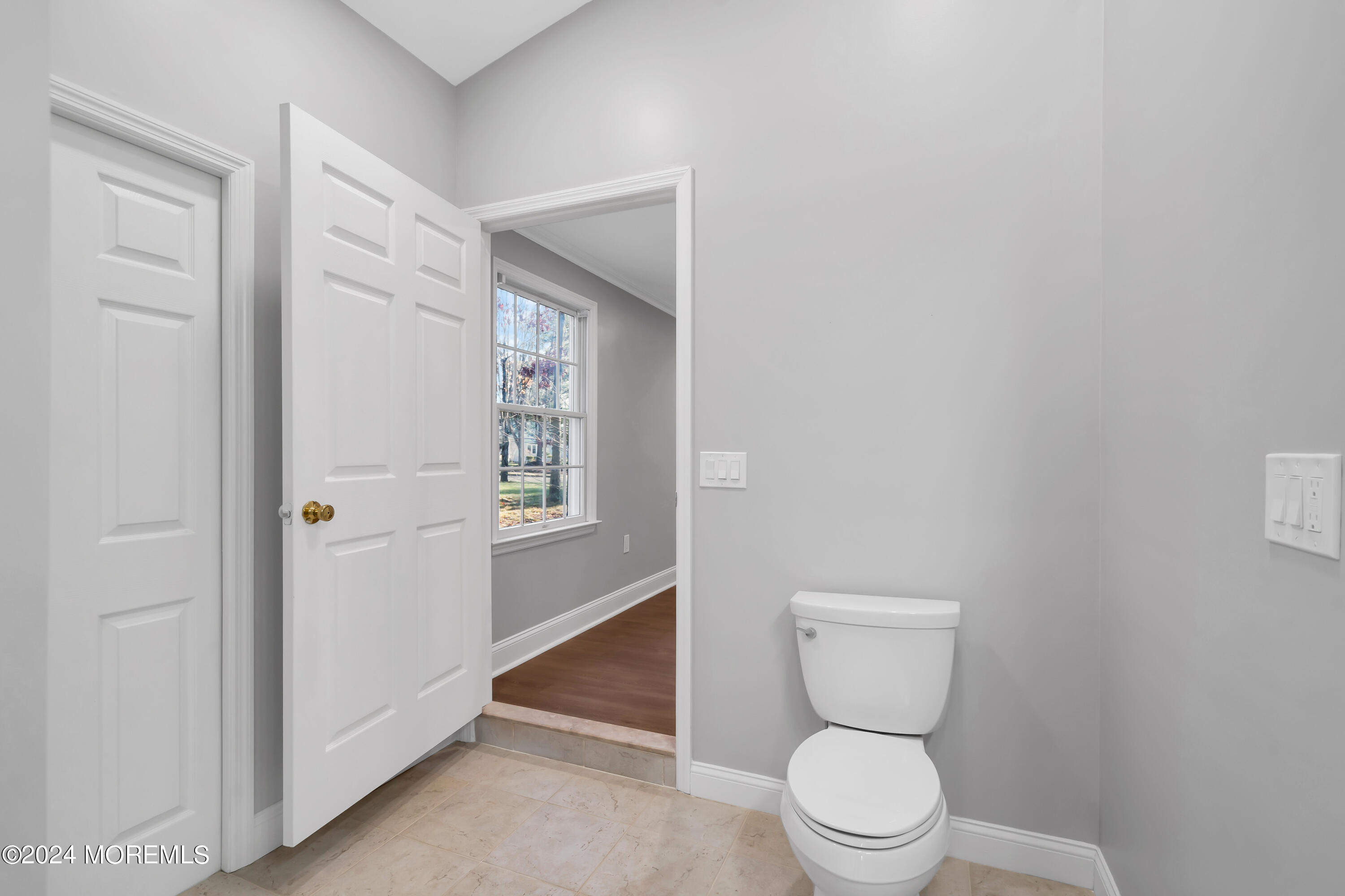 6 Afton Road Jackson, NJ 08527 - Photo 46 of 80 a white toilet sitting next to a bathroom sink and vanity