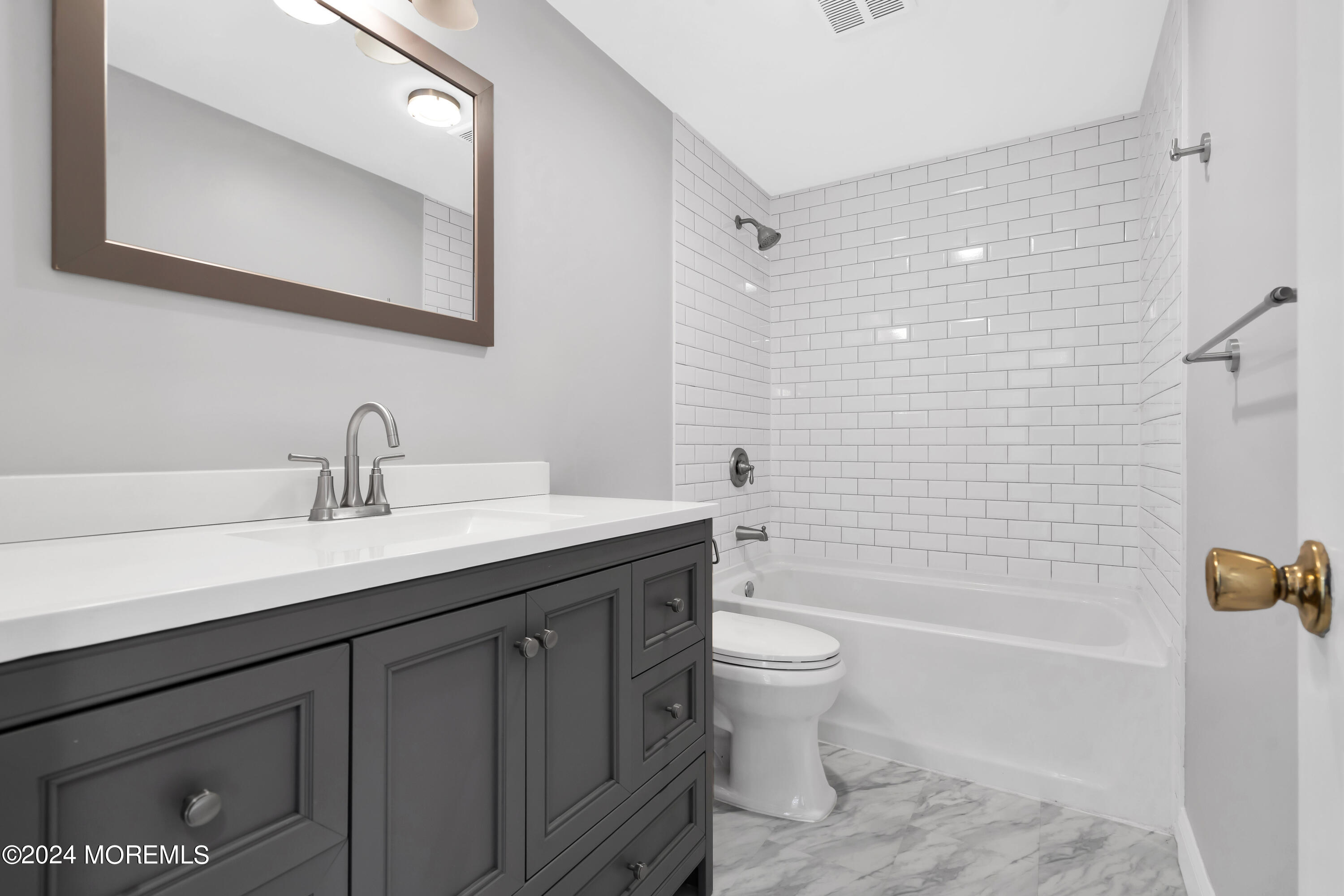 6 Afton Road Jackson, NJ 08527 - Photo 50 of 80 a bathroom with a sink a toilet and shower