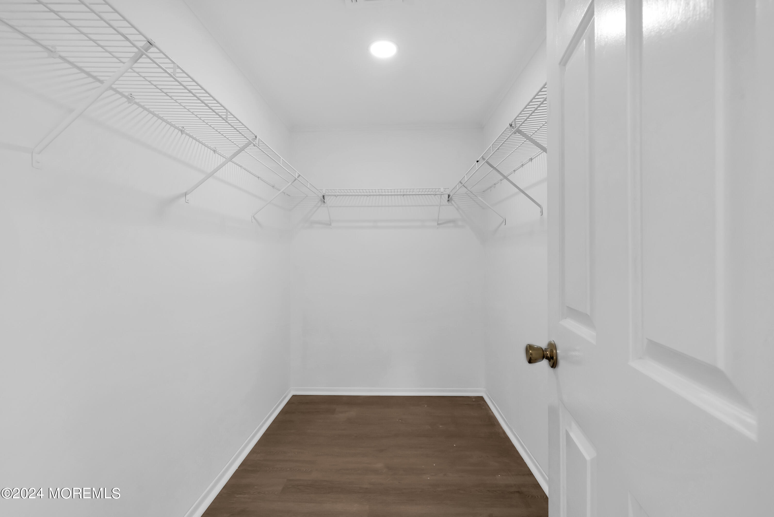 6 Afton Road Jackson, NJ 08527 - Photo 57 of 80 a view of a room with racks on the wall