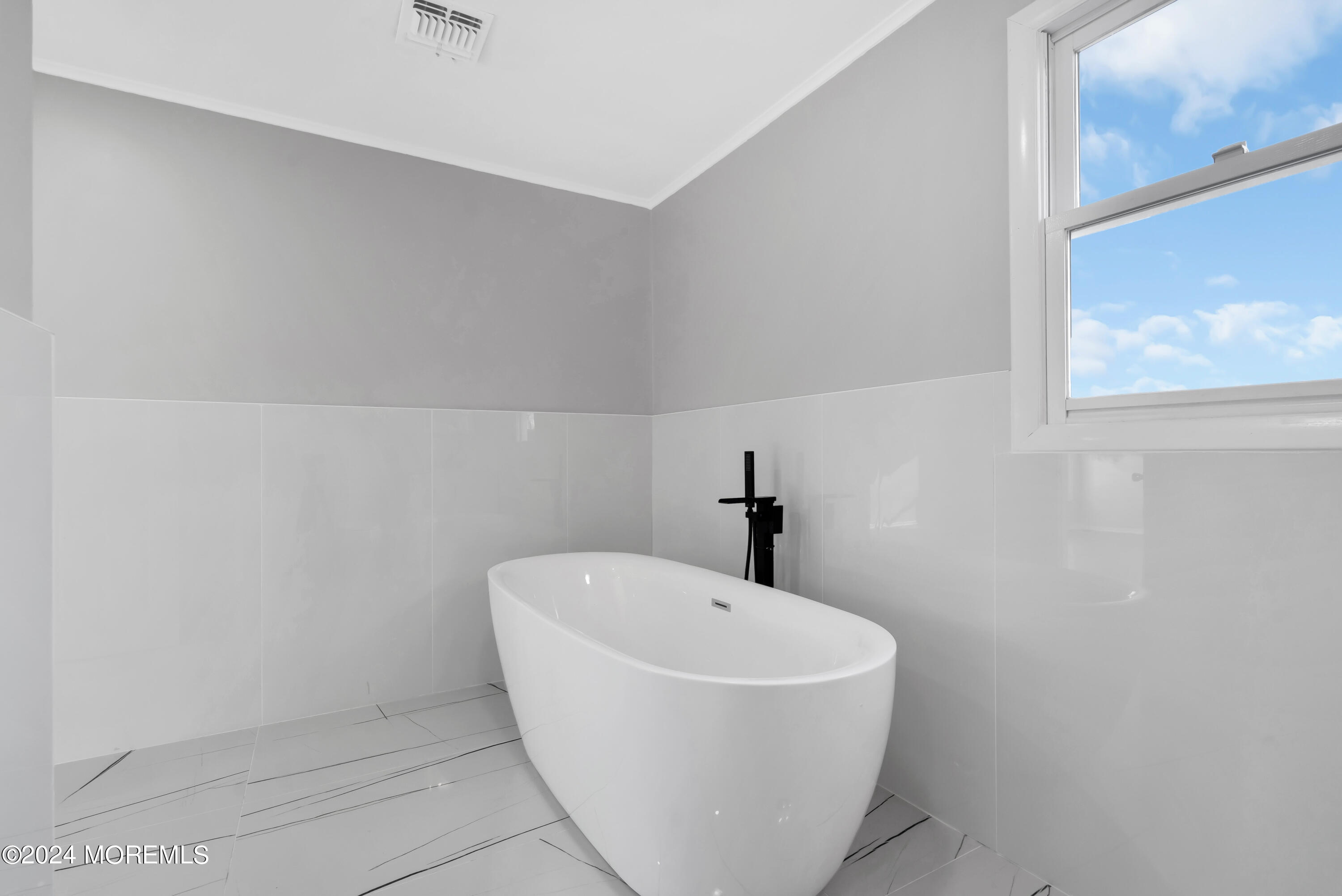 6 Afton Road Jackson, NJ 08527 - Photo 61 of 80 a white bath tub sitting in a bathroom