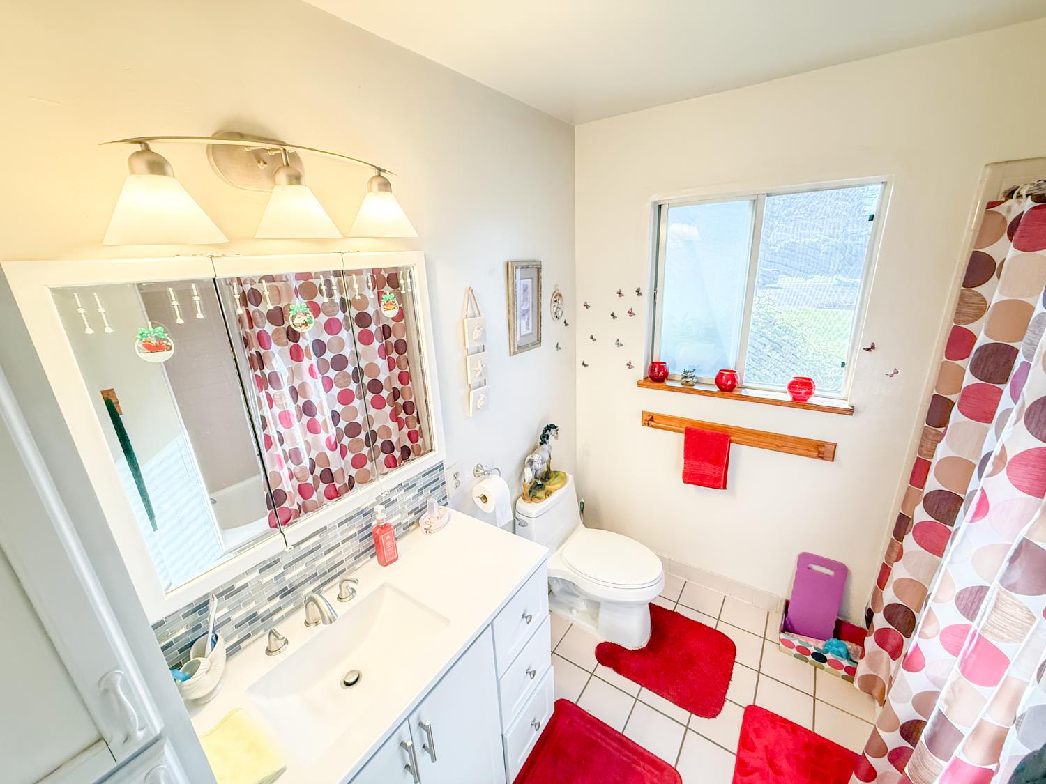 161 Ribier Avenue Modesto, CA 95350 - Photo 12 of 26 a bathroom with a sink toilet and shower