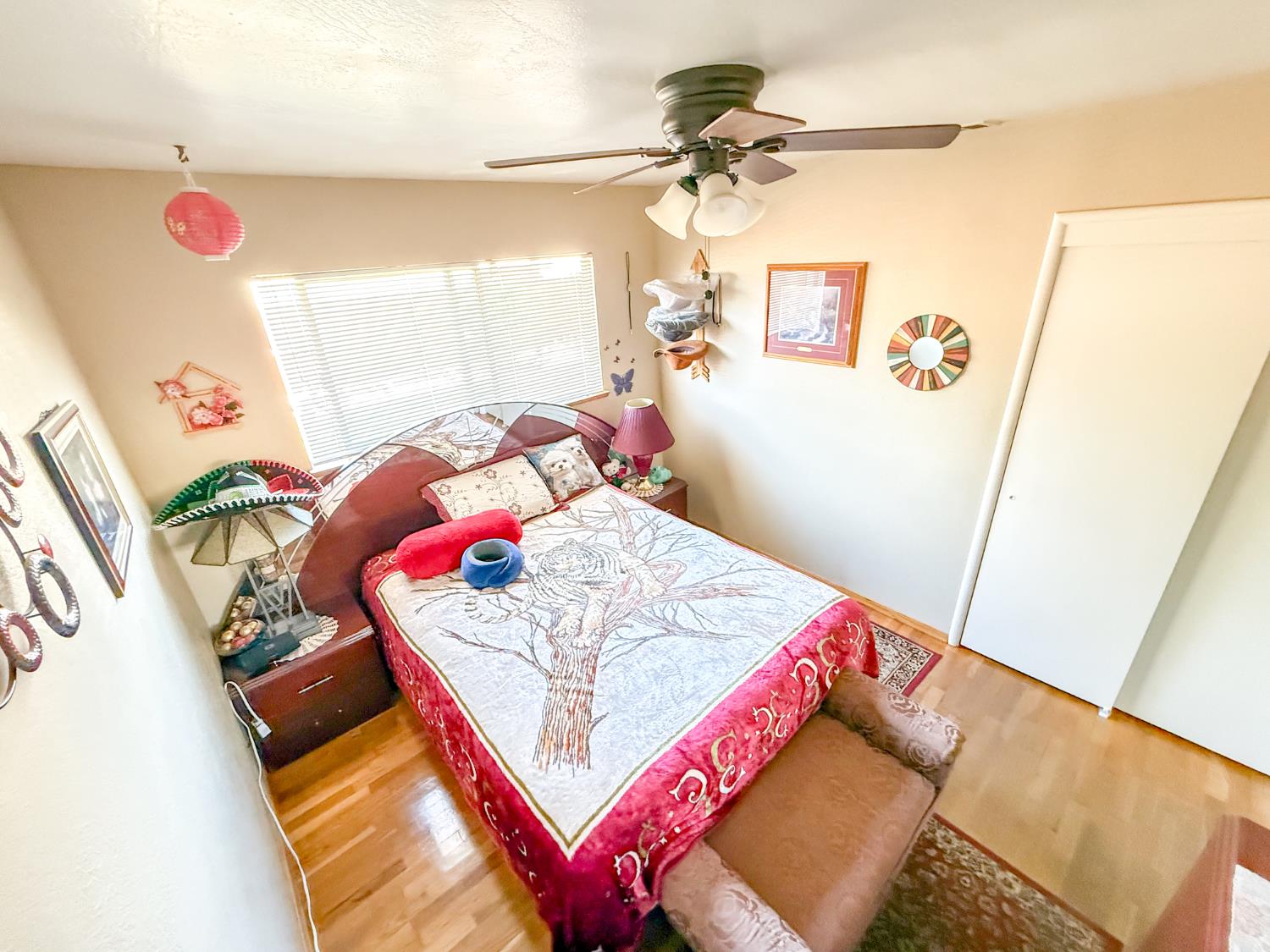 161 Ribier Avenue Modesto, CA 95350 - Photo 18 of 26 a bedroom with a bed and a window