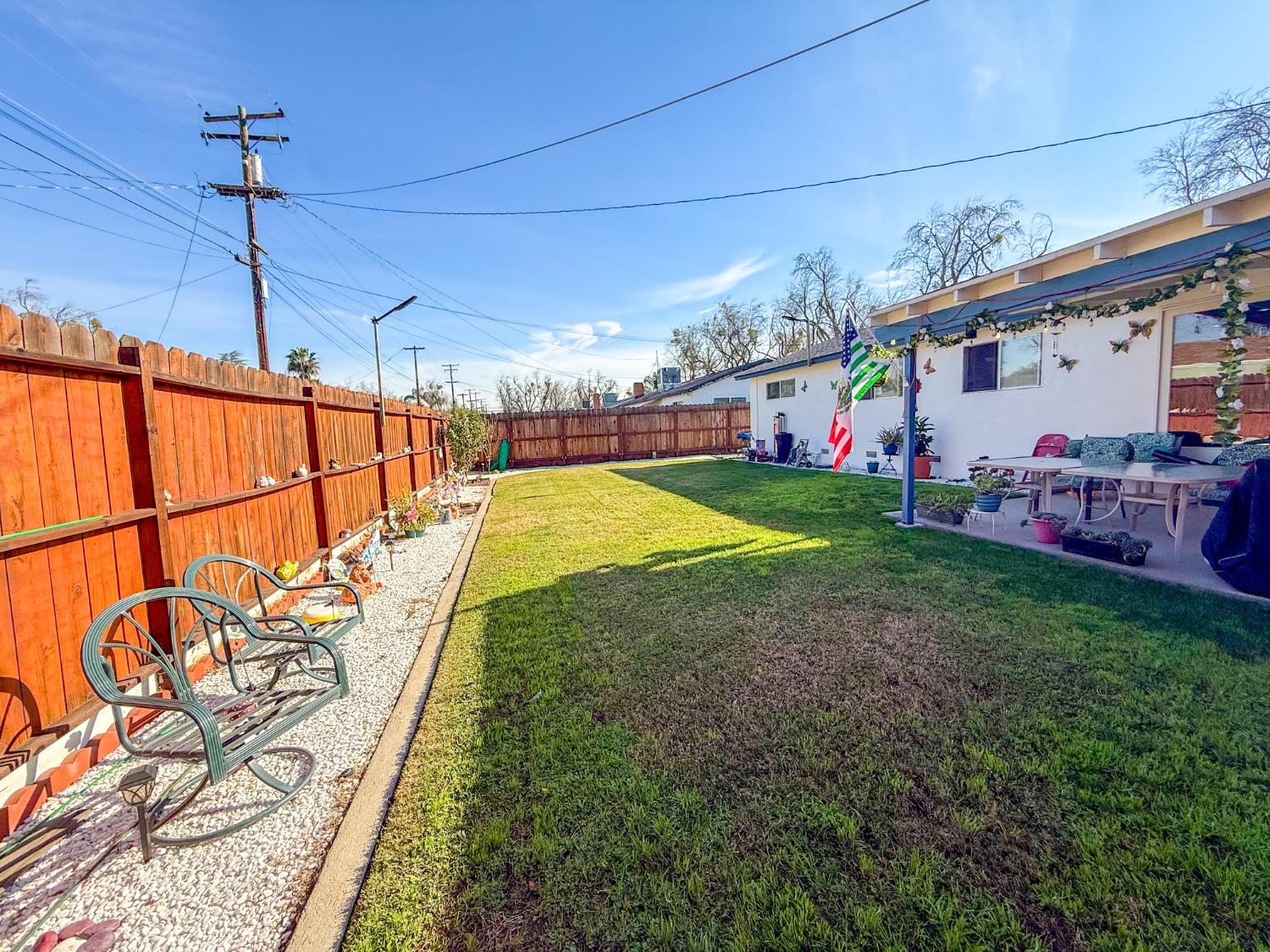 161 Ribier Avenue Modesto, CA 95350 - Photo 22 of 26 a view of a backyard with sitting area
