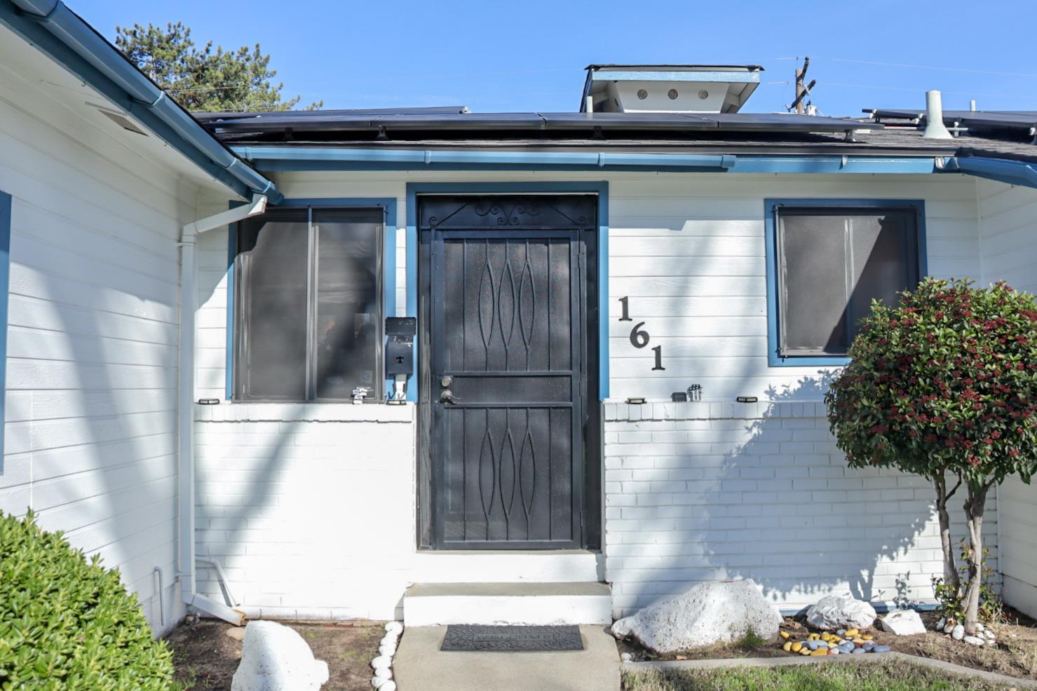 161 Ribier Avenue Modesto, CA 95350 - Photo 4 of 26 a view of a house with a outdoor space