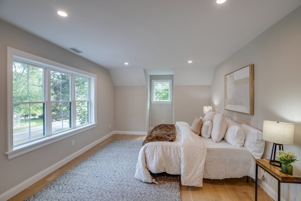 25 Webber Avenue Bedford, MA 01730 - Photo 22 of 42 a bedroom with bed and a window