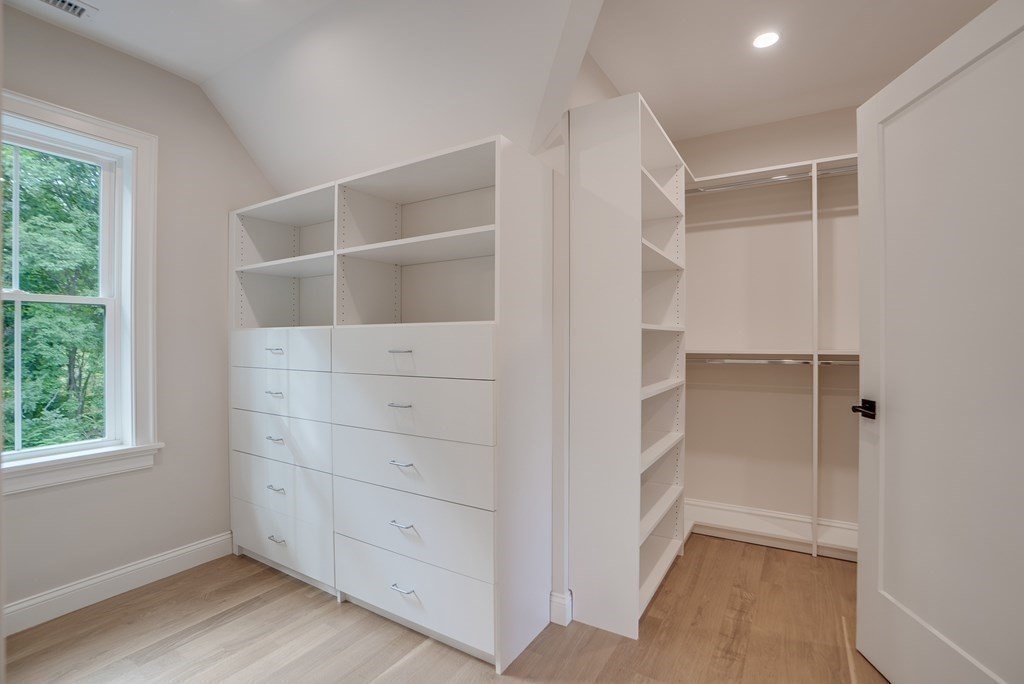 25 Webber Avenue Bedford, MA 01730 - Photo 24 of 42 an empty room with a closet