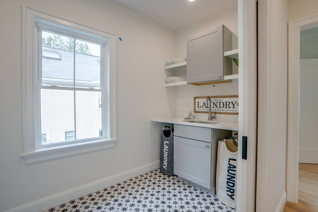 25 Webber Avenue Bedford, MA 01730 - Photo 35 of 42 a view of kitchen and utility room