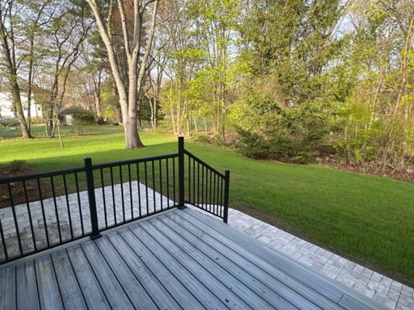 25 Webber Avenue Bedford, MA 01730 - Photo 37 of 42 a view of deck with wooden floor and fence