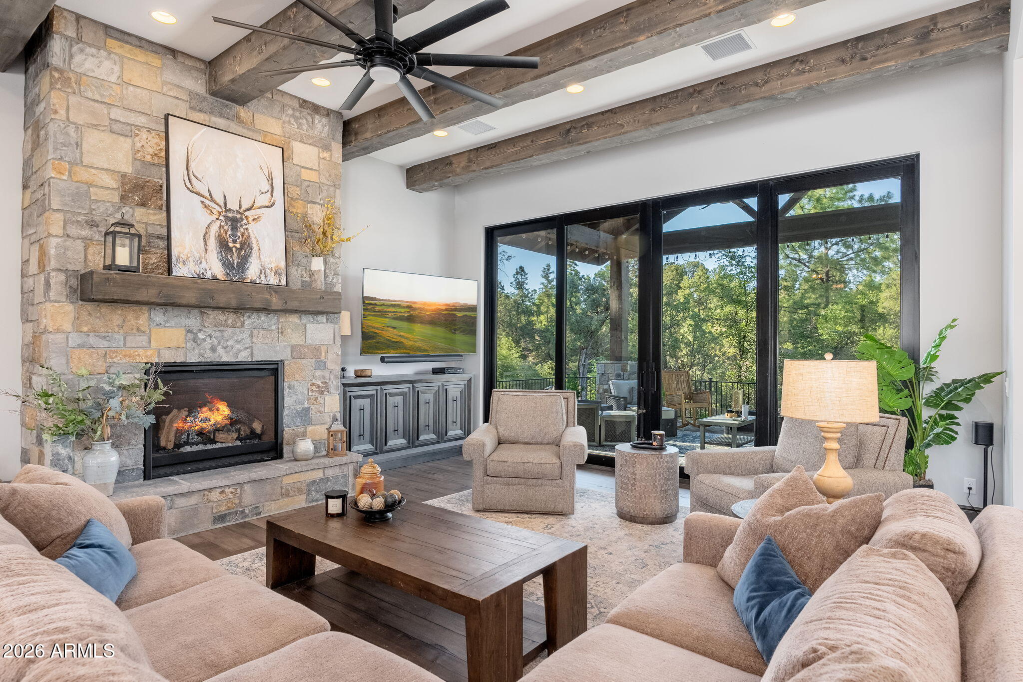 602 North Redbud Circle Payson, AZ 85541 - Photo 13 of 83 a living room with furniture a fireplace and a large window