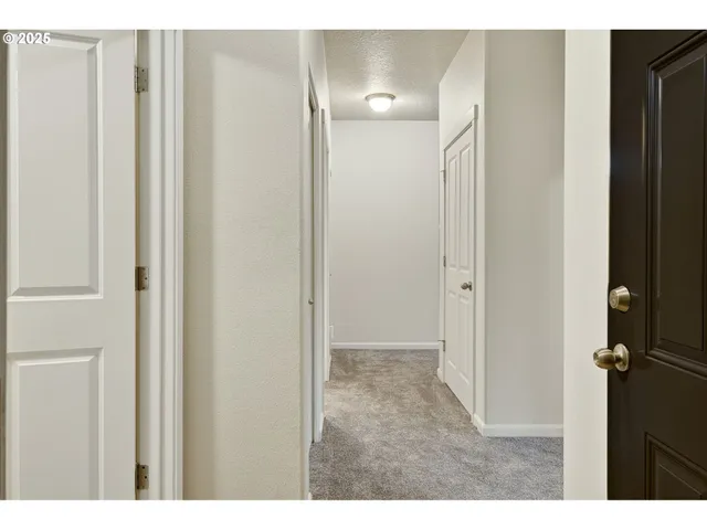 a view of a bathroom with a glass door