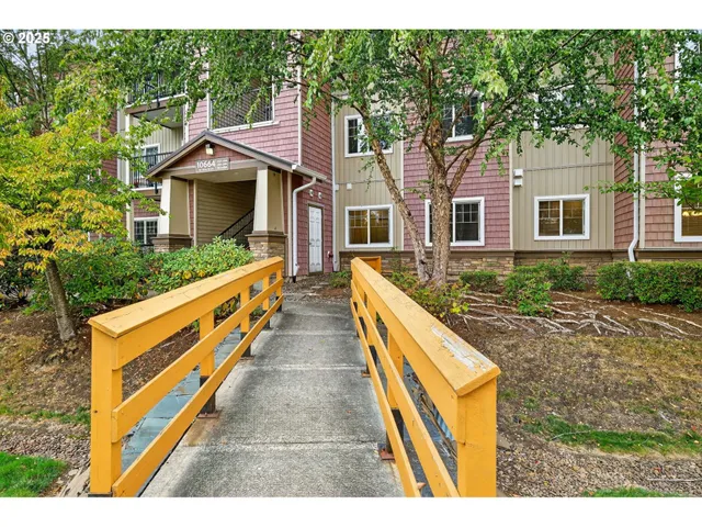 a front view of a house with yard