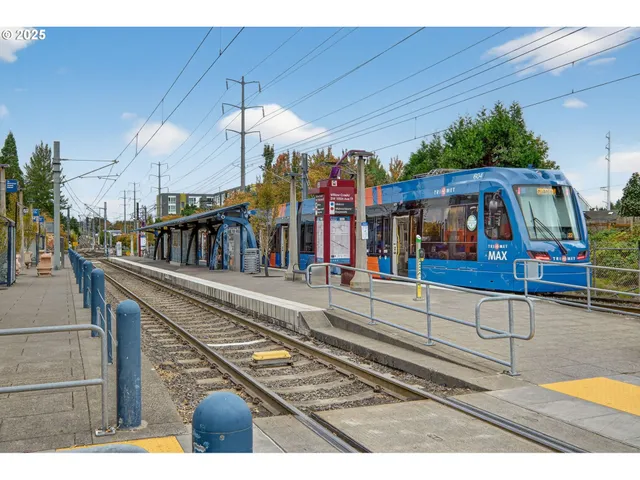 a view of a chairs and table on the balcony