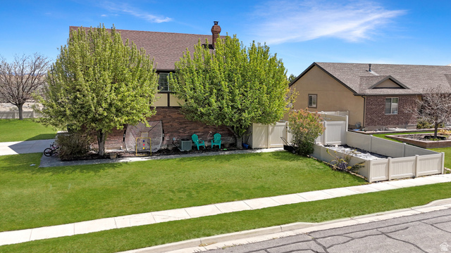 1716 Sagewood Road Price, UT 84501 - Photo 61 of 73 View of front facade featuring a chimney and brick siding