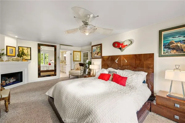 a bathroom with a double vanity sink mirror and shower