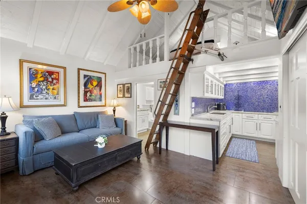a kitchen with a sink stove and refrigerator