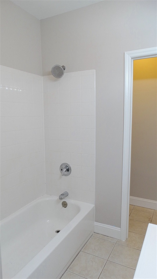 10404 Veasey Mill Road Raleigh, NC 27615 - Photo 24 of 30 Lower Level Tub Shower