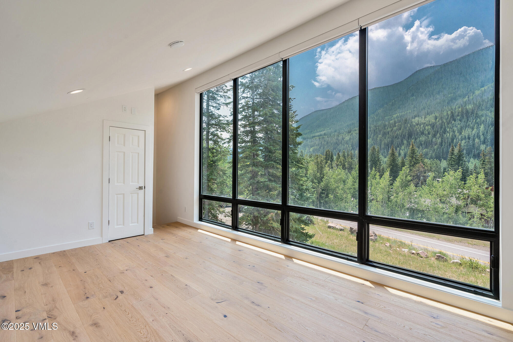 4545 Big Horn Road Vail, CO 81657 - Photo 29 of 49 a view of a room with sliding glass door
