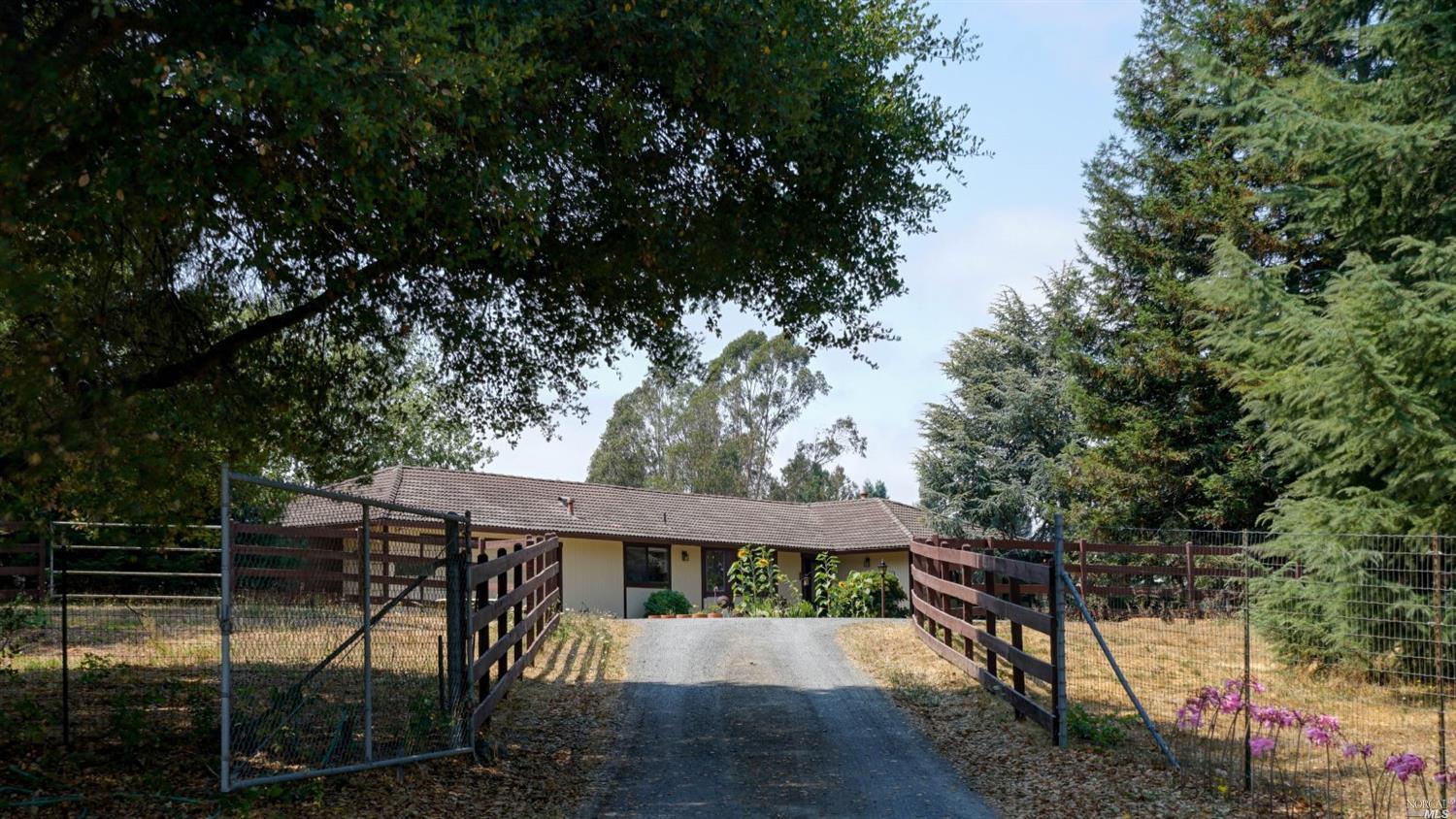 5940 Fredricks Road Sebastopol, CA 95472 - Photo 1 of 1 a view of a wooden deck and a backyard