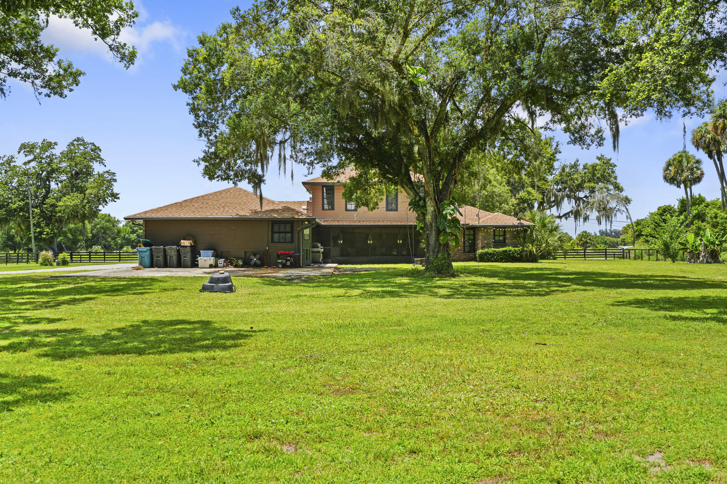 4170 McCarty Road Fort Pierce, FL 34945 - Photo 51 of 57 a front view of a house with a yard