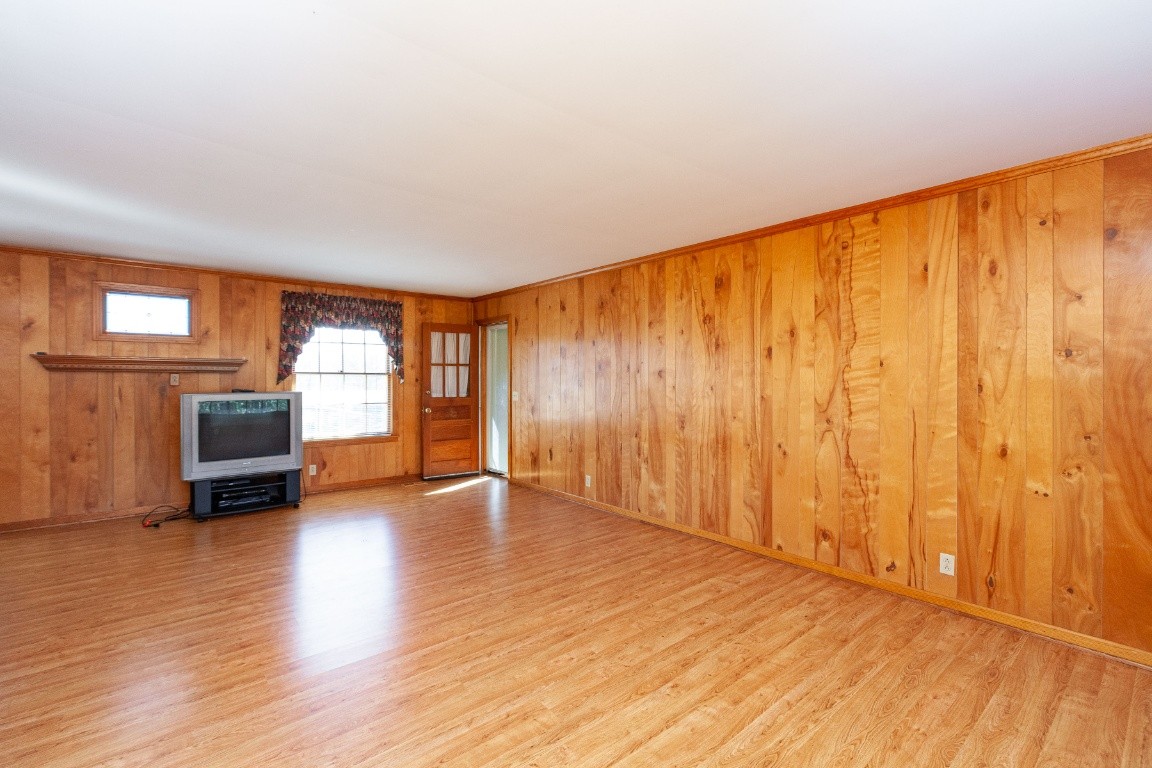 2102 Center Point Road Hendersonville, TN 37075 - Photo 16 of 50 a view of an empty room with a window and wooden floor