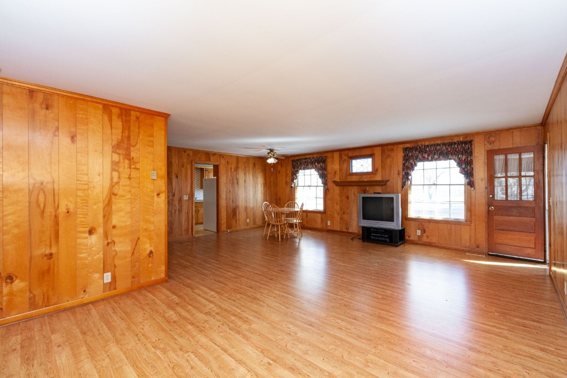 2102 Center Point Road Hendersonville, TN 37075 - Photo 17 of 50 a view of empty room with fireplace and wooden floor