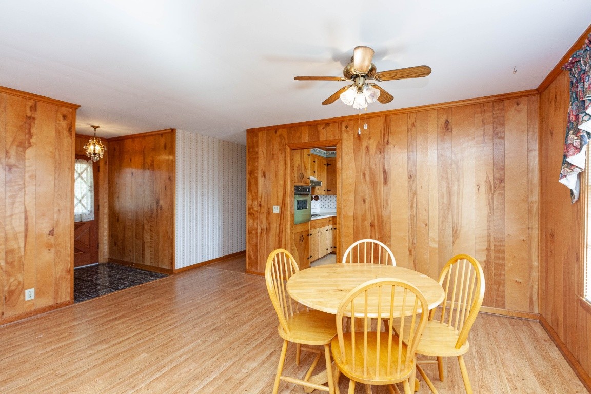 2102 Center Point Road Hendersonville, TN 37075 - Photo 19 of 50 a view of a dining room with furniture window and wooden floor