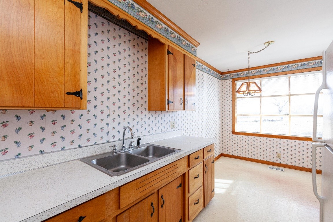 2102 Center Point Road Hendersonville, TN 37075 - Photo 24 of 50 a kitchen with sink cabinets and window