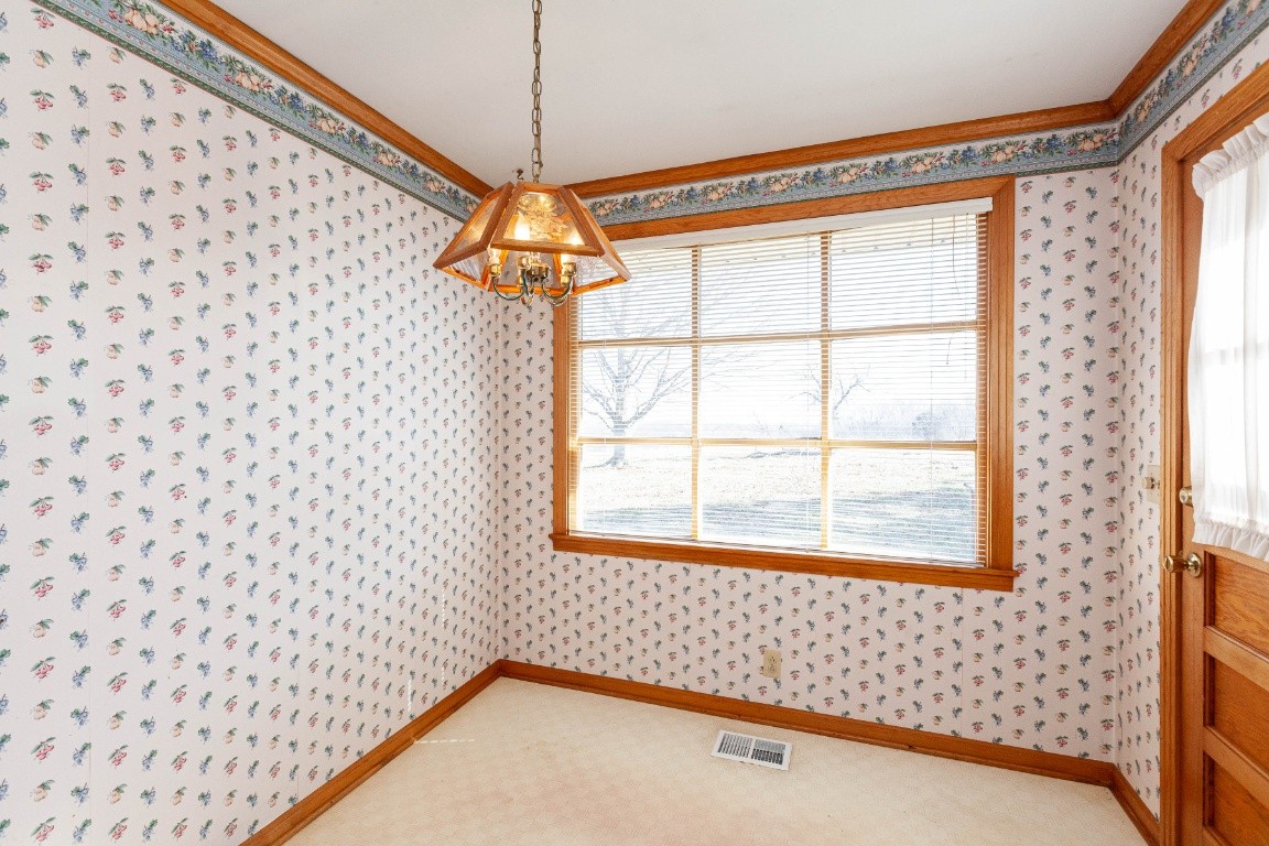 2102 Center Point Road Hendersonville, TN 37075 - Photo 27 of 50 a view of a livingroom with wooden floor and a chandelier
