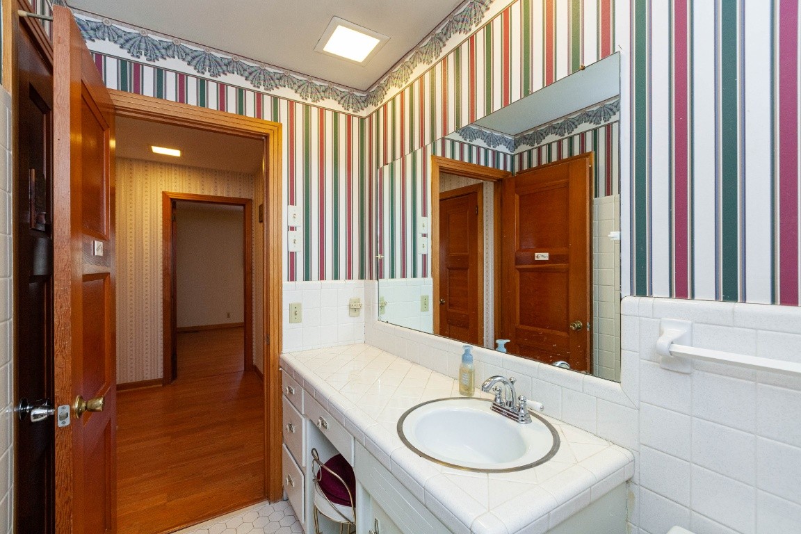 2102 Center Point Road Hendersonville, TN 37075 - Photo 37 of 50 a bathroom with a sink and a mirror
