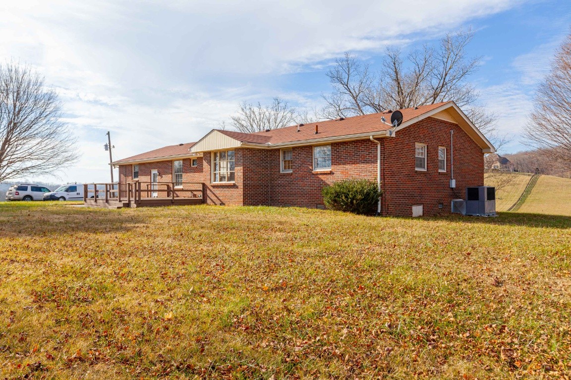 2102 Center Point Road Hendersonville, TN 37075 - Photo 41 of 50 a front view of a house with a yard and trees