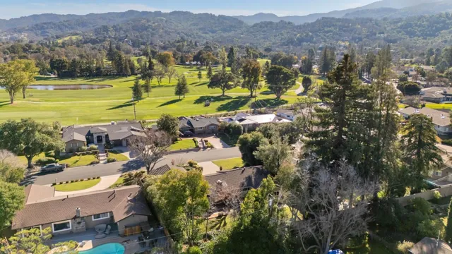 a view of a city with mountains in the background