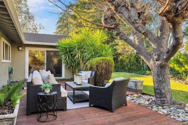 a view of a swimming pool and lounge chair