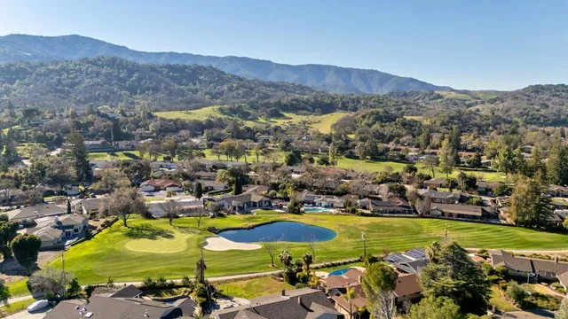 a view of a city with mountains in the background