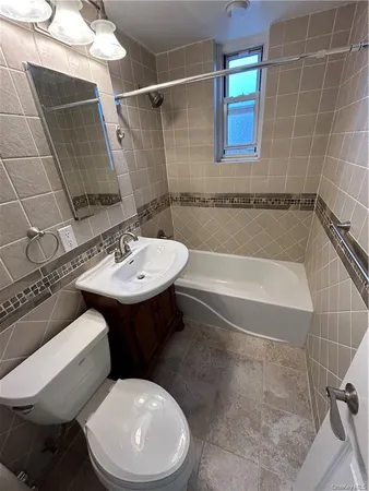 a room with a desk and dryer