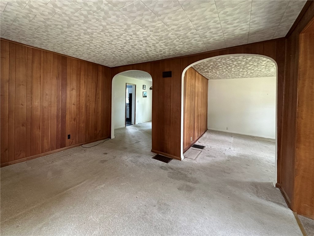 55 North Maple Street Warsaw, NY 14569 - Photo 7 of 33 Living room looking toward dining room on the left and front room on the right