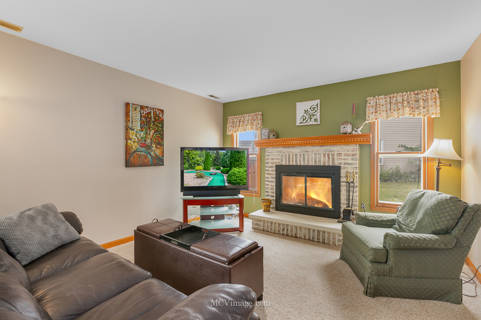 1991 Valley Road Lombard, IL 60148 - Photo 16 of 40 a living room with furniture and a fireplace