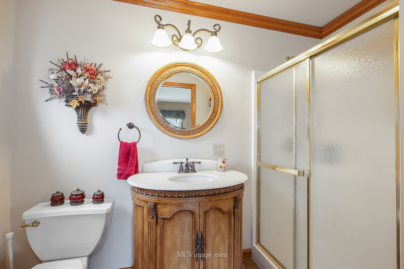 1991 Valley Road Lombard, IL 60148 - Photo 21 of 40 a bathroom with a toilet sink and mirror