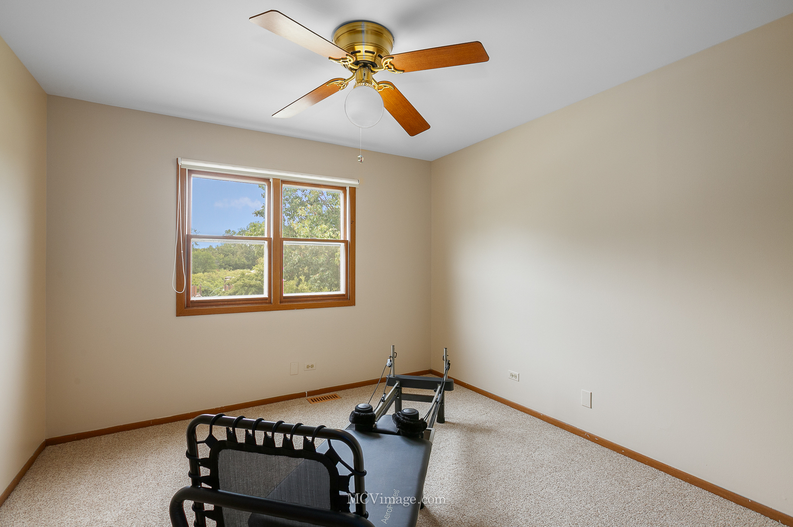 1991 Valley Road Lombard, IL 60148 - Photo 23 of 40 a bedroom with a bed and a chandelier