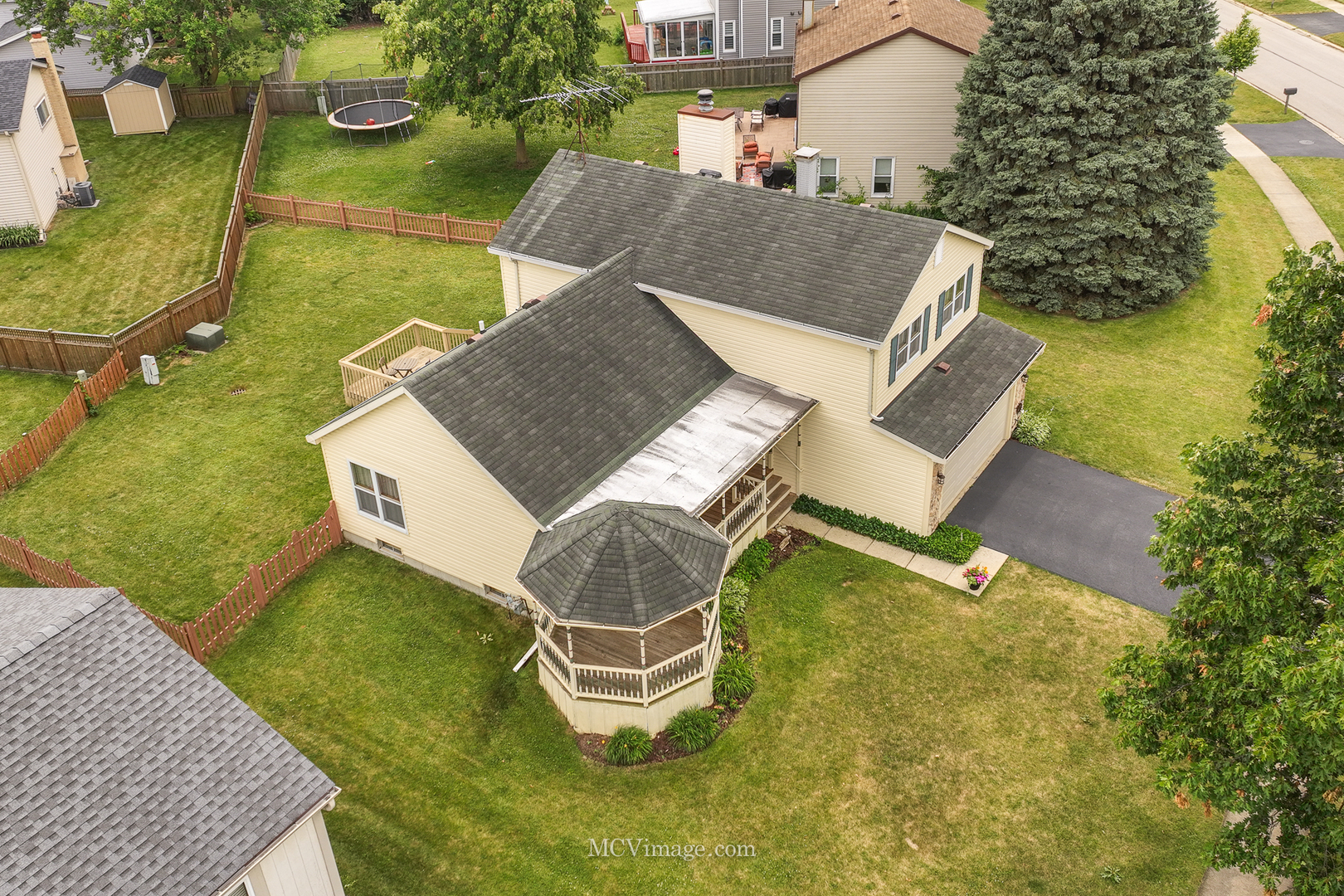 1991 Valley Road Lombard, IL 60148 - Photo 3 of 40 an aerial view of a house with swimming pool and outdoor seating