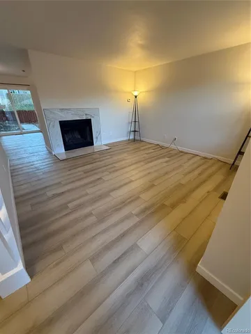 a room with a bed and a flat screen tv